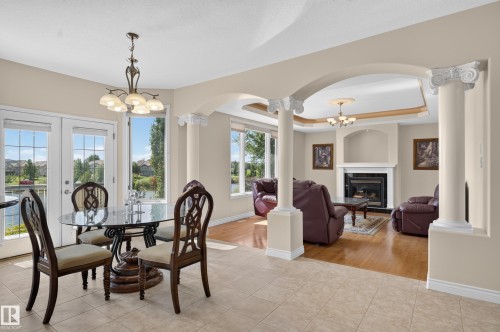 13527 158 Avenue Nw, Edmonton, AB - Indoor Photo Showing Dining Room With Fireplace