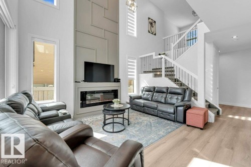 #3525 42 Ave Av, Beaumont, AB - Indoor Photo Showing Living Room With Fireplace