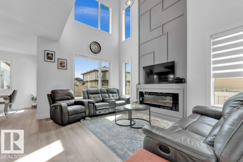 #3525 42 Ave Av, Beaumont, AB - Indoor Photo Showing Living Room With Fireplace