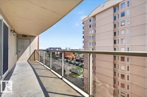 Private balcony with glass panel railing and concrete flooring - #1102 10909 103 Av Nw, Edmonton, AB - Outdoor With Balcony With Exterior
