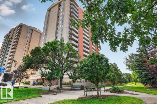 High-rise building with numerous balconies, featuring a brick and beige facade - #1102 10909 103 Av Nw, Edmonton, AB - Outdoor With Facade