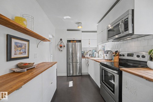 12131 126 Street Nw, Edmonton, AB - Indoor Photo Showing Kitchen With Stainless Steel Kitchen