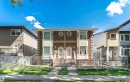 Brick and stucco facade with bay windows and hexagonal accents - 12241 93 Street Nw, Edmonton, AB  - Outdoor With Deck Patio Veranda With Facade 