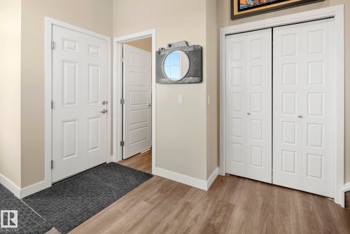 Wood-finish flooring - 7135 Edgemont Way Nw, Edmonton, AB 