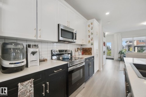 1298 Mcconachie Boulevard Nw, Edmonton, AB - Indoor Photo Showing Kitchen With Double Sink