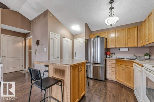#404 3425 19 St Nw, Edmonton, AB - Indoor Photo Showing Kitchen With Double Sink