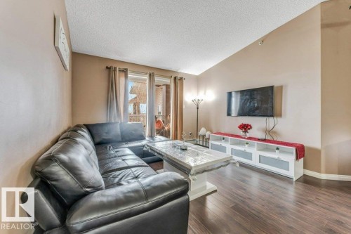 #404 3425 19 St Nw, Edmonton, AB - Indoor Photo Showing Living Room