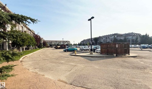 Paved parking area with extensive space - #1111 7339 South Terwillegar Dr Nw, Edmonton, AB - Outdoor
