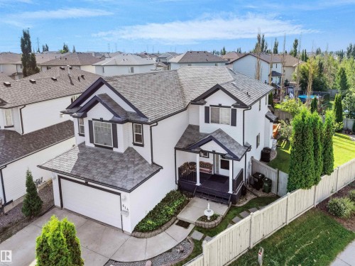 Two-story home with white siding and dark trim accents - 614 Silver Berry Road Nw, Edmonton, AB - Outdoor