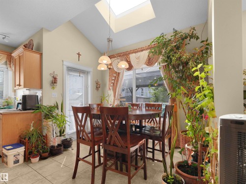 Vaulted ceiling with skylight and recessed lighting - 614 Silver Berry Road Nw, Edmonton, AB - Indoor Photo Showing Dining Room