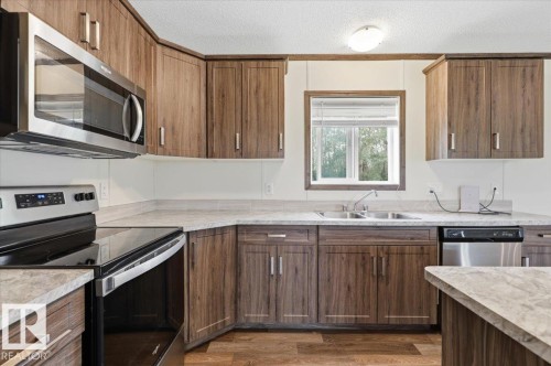 1409 Twp Rd 502, Rural Leduc County, AB - Indoor Photo Showing Kitchen With Double Sink