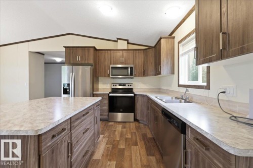 1409 Twp Rd 502, Rural Leduc County, AB - Indoor Photo Showing Kitchen With Double Sink With Upgraded Kitchen