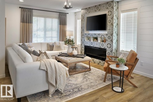 9008 Gilbert Close Nw, Edmonton, AB - Indoor Photo Showing Living Room With Fireplace