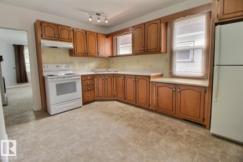 11626 87 Street Nw, Edmonton, AB - Indoor Photo Showing Kitchen With Double Sink