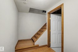 Wood-finish flooring with matching staircase treads and risers - 