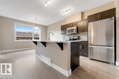 2122 24 Street Nw, Edmonton, AB - Indoor Photo Showing Kitchen With Stainless Steel Kitchen With Upgraded Kitchen