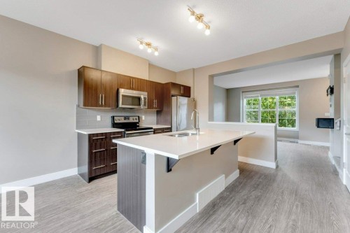 2122 24 Street Nw, Edmonton, AB - Indoor Photo Showing Kitchen With Stainless Steel Kitchen With Double Sink