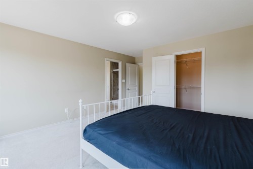 Wall-to-wall carpeting and neutral wall paint - 864 Armitage Wynd Sw, Edmonton, AB - Indoor Photo Showing Other Room