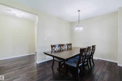 Hardwood-style flooring throughout - 864 Armitage Wynd Sw, Edmonton, AB - Indoor Photo Showing Dining Room