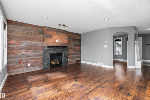 1103 115 Street Sw, Edmonton, AB - Indoor Photo Showing Living Room With Fireplace