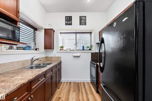 1103 115 Street Sw, Edmonton, AB - Indoor Photo Showing Kitchen With Double Sink