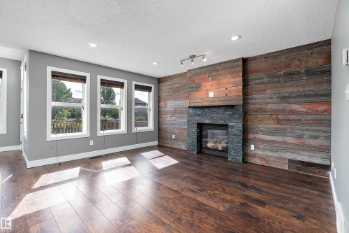 1103 115 Street Sw, Edmonton, AB - Indoor Photo Showing Living Room With Fireplace