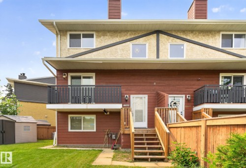 Multi-level exterior featuring wood siding and stucco finishes - 10644 158 Avenue Nw, Edmonton, AB - Outdoor With Balcony