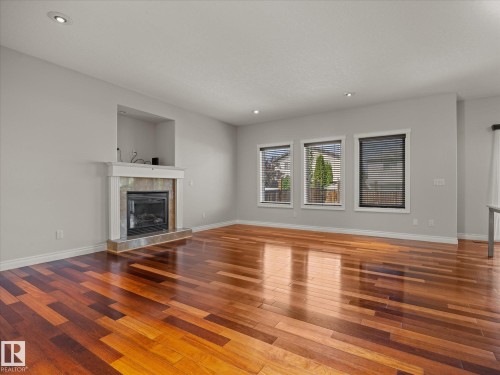 4704 160 Avenue Nw, Edmonton, AB - Indoor Photo Showing Living Room With Fireplace