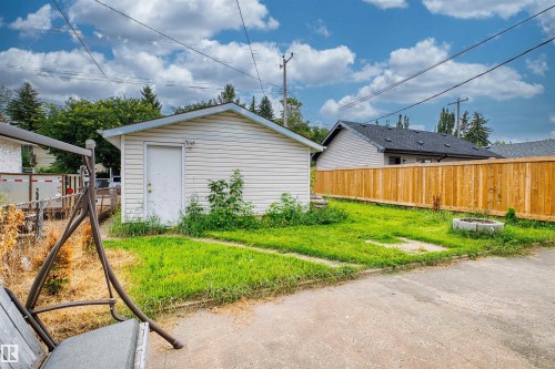 Detached garage with siding exterior - 8723 81 Avenue Nw, Edmonton, AB - Outdoor