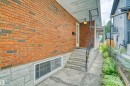 Brick exterior with a stone foundation - 8723 81 Avenue Nw, Edmonton, AB  - Outdoor With Exterior 
