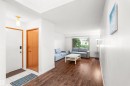 White interior walls with wood-finish flooring - 8723 81 Avenue Nw, Edmonton, AB  - Indoor 