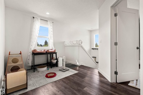 Recessed ceiling lighting illuminates the interior - 15713 102 Avenue Nw, Edmonton, AB - Indoor Photo Showing Other Room