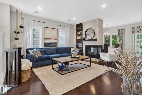 2327 Frezenberg Avenue Nw, Edmonton, AB - Indoor Photo Showing Living Room With Fireplace