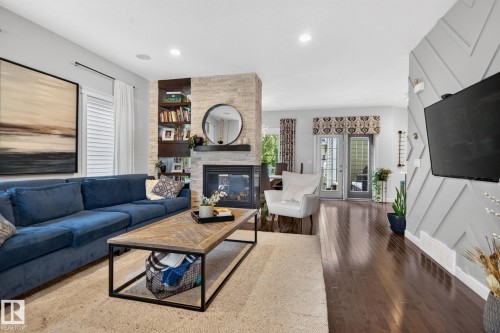 2327 Frezenberg Avenue Nw, Edmonton, AB - Indoor Photo Showing Living Room With Fireplace