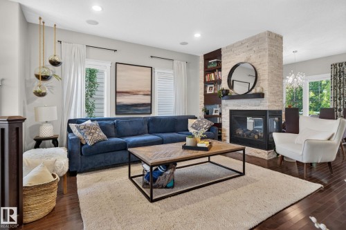 2327 Frezenberg Avenue Nw, Edmonton, AB - Indoor Photo Showing Living Room With Fireplace