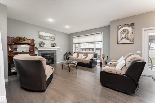 2055 Redtail Common Nw, Edmonton, AB - Indoor Photo Showing Living Room With Fireplace