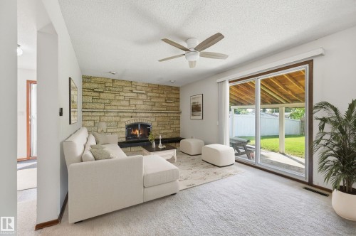 8119 24 Avenue Nw, Edmonton, AB - Indoor Photo Showing Other Room With Fireplace