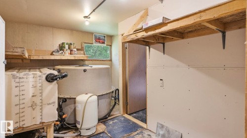 Additional content - 52012 Hwy 21, Rural Strathcona County, AB - Indoor Photo Showing Garage