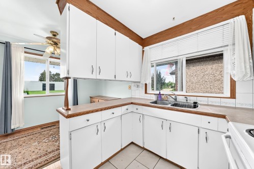 7312 Delwood Road Nw, Edmonton, AB - Indoor Photo Showing Kitchen With Double Sink