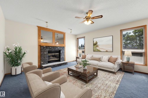 15304 74 Street Nw, Edmonton, AB - Indoor Photo Showing Living Room With Fireplace