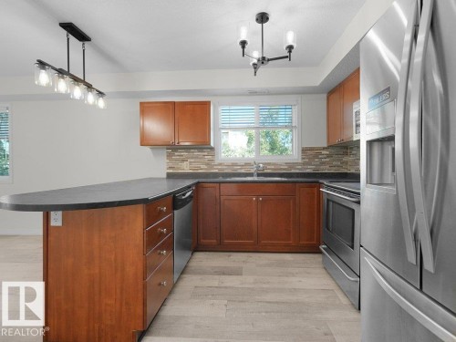 #206 260 Lewis Estates Bv Nw, Edmonton, AB - Indoor Photo Showing Kitchen With Double Sink