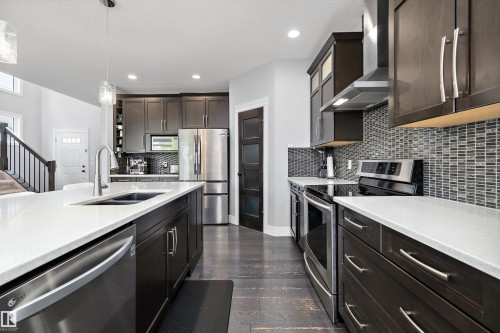 7656 182 Avenue Nw, Edmonton, AB - Indoor Photo Showing Kitchen With Double Sink With Upgraded Kitchen