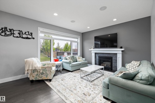 7656 182 Avenue Nw, Edmonton, AB - Indoor Photo Showing Living Room With Fireplace
