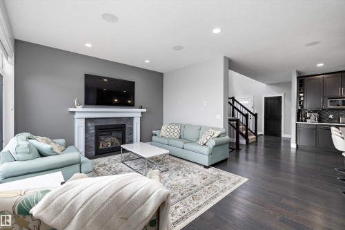7656 182 Avenue Nw, Edmonton, AB - Indoor Photo Showing Living Room With Fireplace