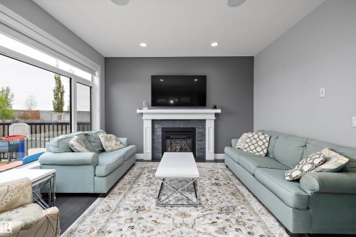 7656 182 Avenue Nw, Edmonton, AB - Indoor Photo Showing Living Room With Fireplace