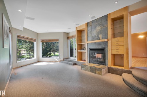11446 75 Avenue Nw, Edmonton, AB - Indoor Photo Showing Living Room With Fireplace