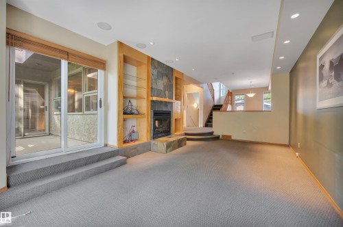 11446 75 Avenue Nw, Edmonton, AB - Indoor Photo Showing Other Room With Fireplace