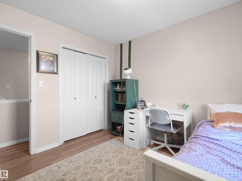 #90 5001 62 St, Beaumont, AB - Indoor Photo Showing Bedroom