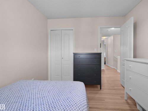 #90 5001 62 St, Beaumont, AB - Indoor Photo Showing Bedroom