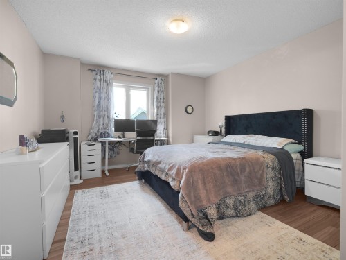 #90 5001 62 St, Beaumont, AB - Indoor Photo Showing Bedroom